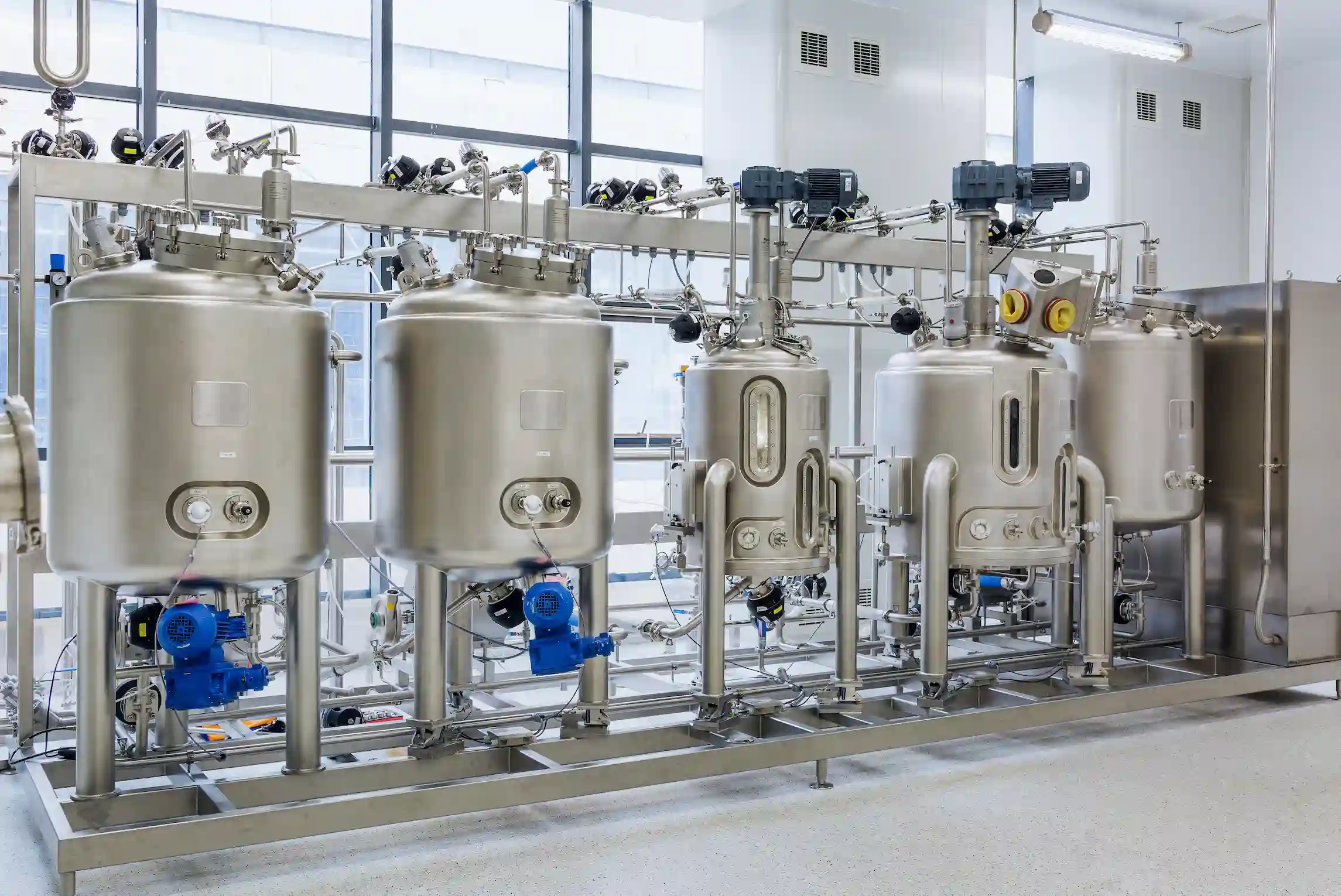 Stainless steel bioreactors in a pharmaceutical facility used for peptide and API manufacturing processes